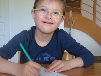 Les enfants trisomiques et l’écriture cursive Les enfants trisomiques et l’écriture cursive